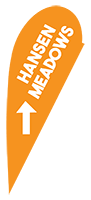 Orange directional sign for Hansen and the Meadows Halls.