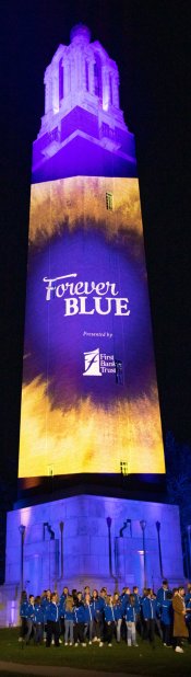 campanile lit up with forever blue