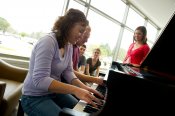 Students in classroom at piano