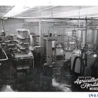 Volga Farmer's Co-Op Creamery interior photo featuring multiple pieces of equipment.