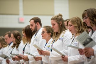 Pharmacy Students Receiving Their White Coats
