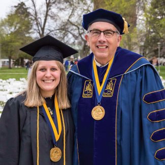 President Barry H. Dunn and Rhodes scholar Hattie Seten after the 2021 commencement ceremony