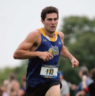 Male SDSU cross country runner competing.