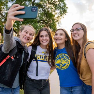 four female students taking a selfie