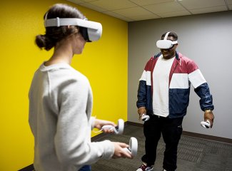 Students use virtual reality headsets in the Jacks Esports Lounge.