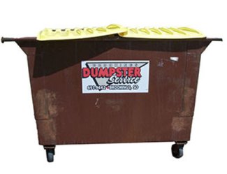 Brown trash dumpster with a yellow lid 