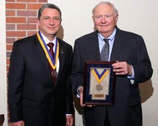 Nadim Wehbe and John Hanson pictured with endowed medallions.