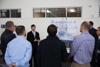 SDSU engineering students present their project at the 2023 Engineering Expo at the Raven Precision Agricultural Center.