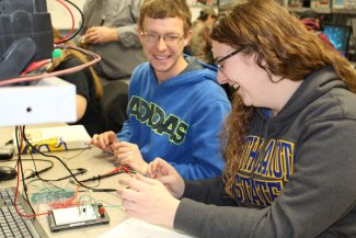 Electronics Engineering Technology students working in the classroom