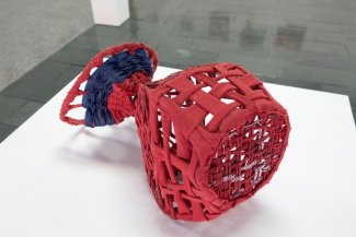 red sculpture made by student